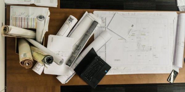 blue prints on a desk